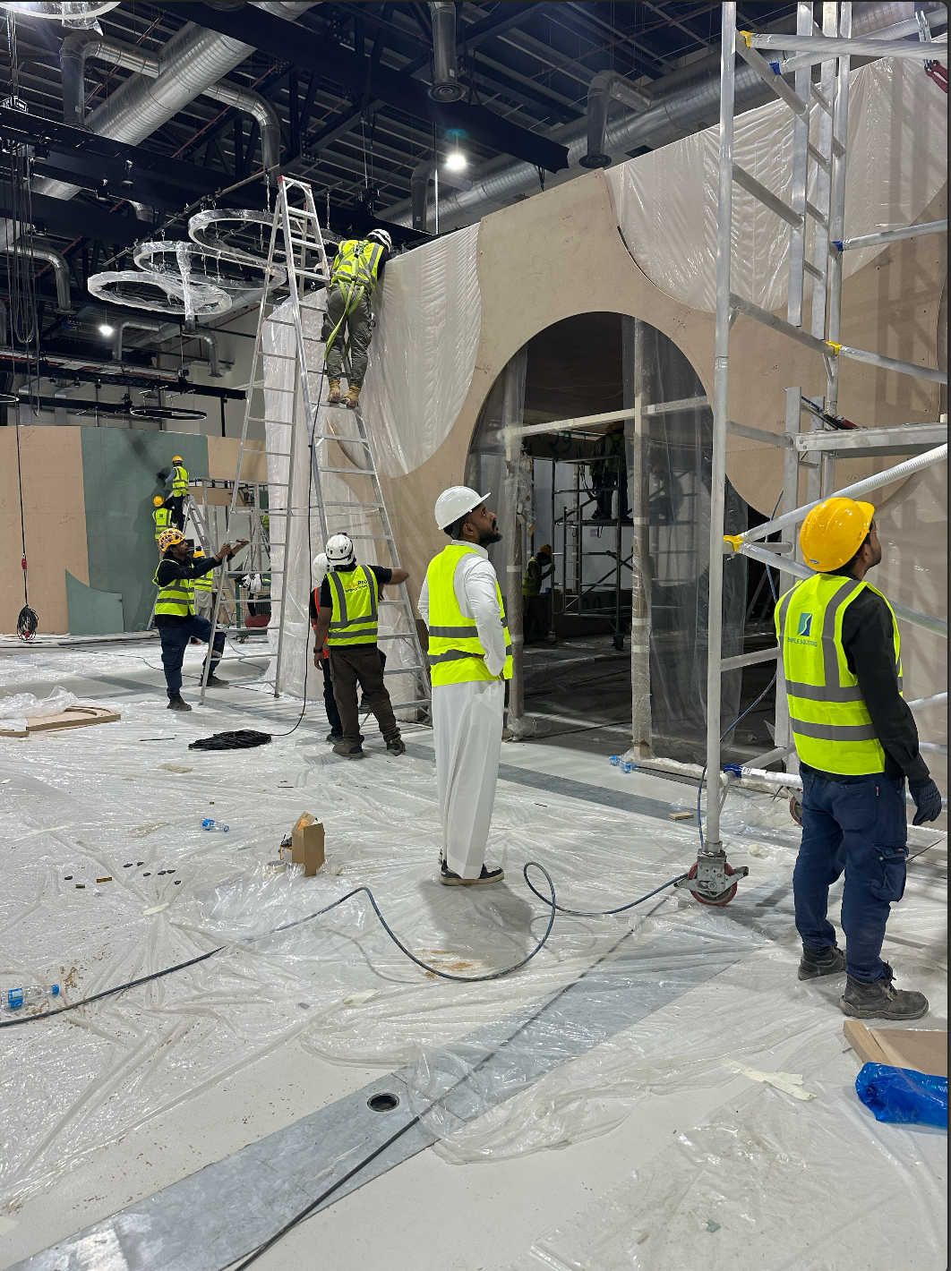 Amgad Fadl conducting production inspections and safety checks during Misk Global Forum site preparation